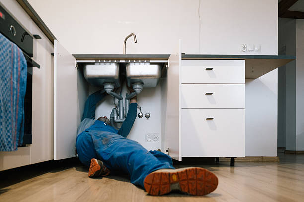 Professional Emergency Plumber technician working in Jackson Center, OH